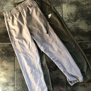 2 pairs of Nike parachute joggers